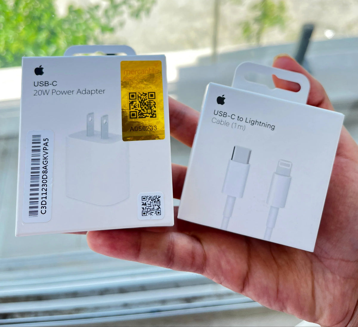 Apple 20W 2-pin power adapter and USB-C to Lightning cable retail boxes