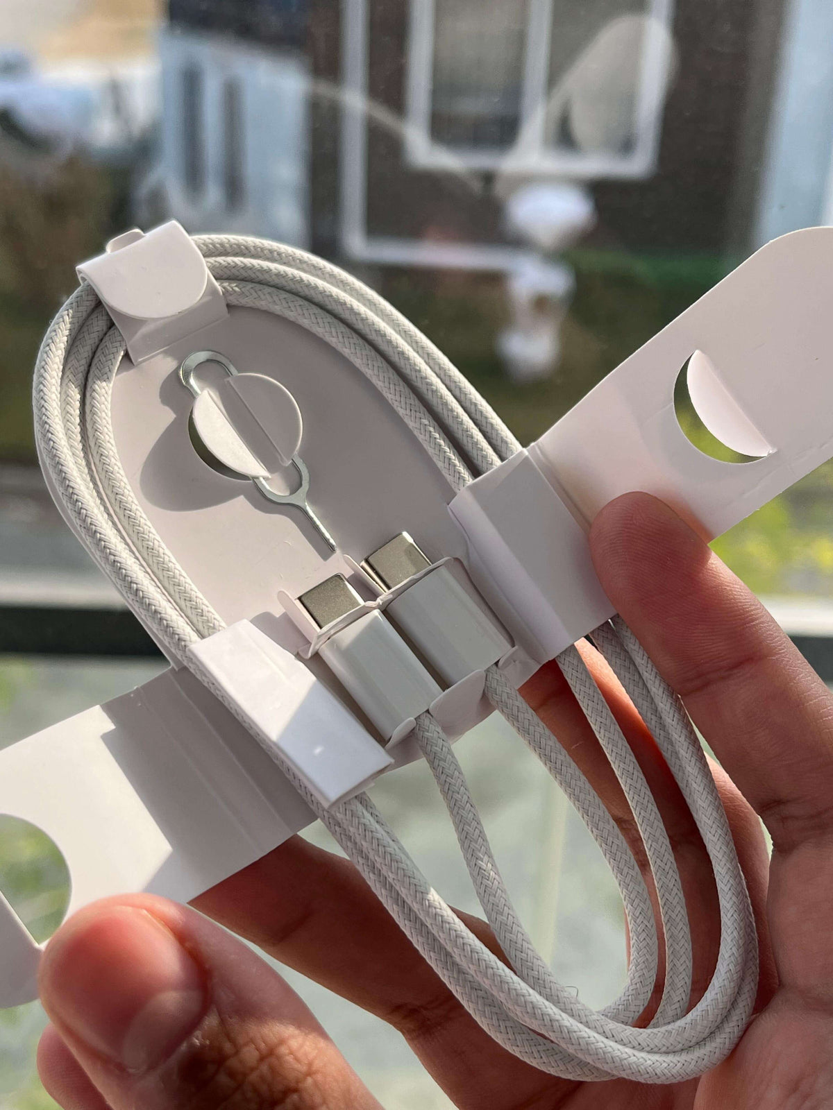 Braided USB-C to USB-C cables and connector ends — angled view