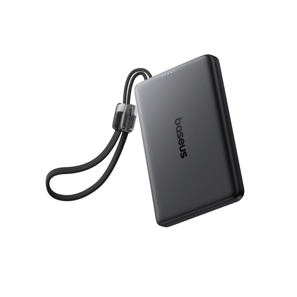 Baseus PicoGo AM41 power bank attached magnetically to a smartphone while charging