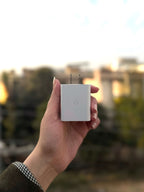 30W USB-C charger with two-pin plug and G logo — front view