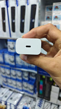 Google 30W USB-C adapter brick front view, box-pulled