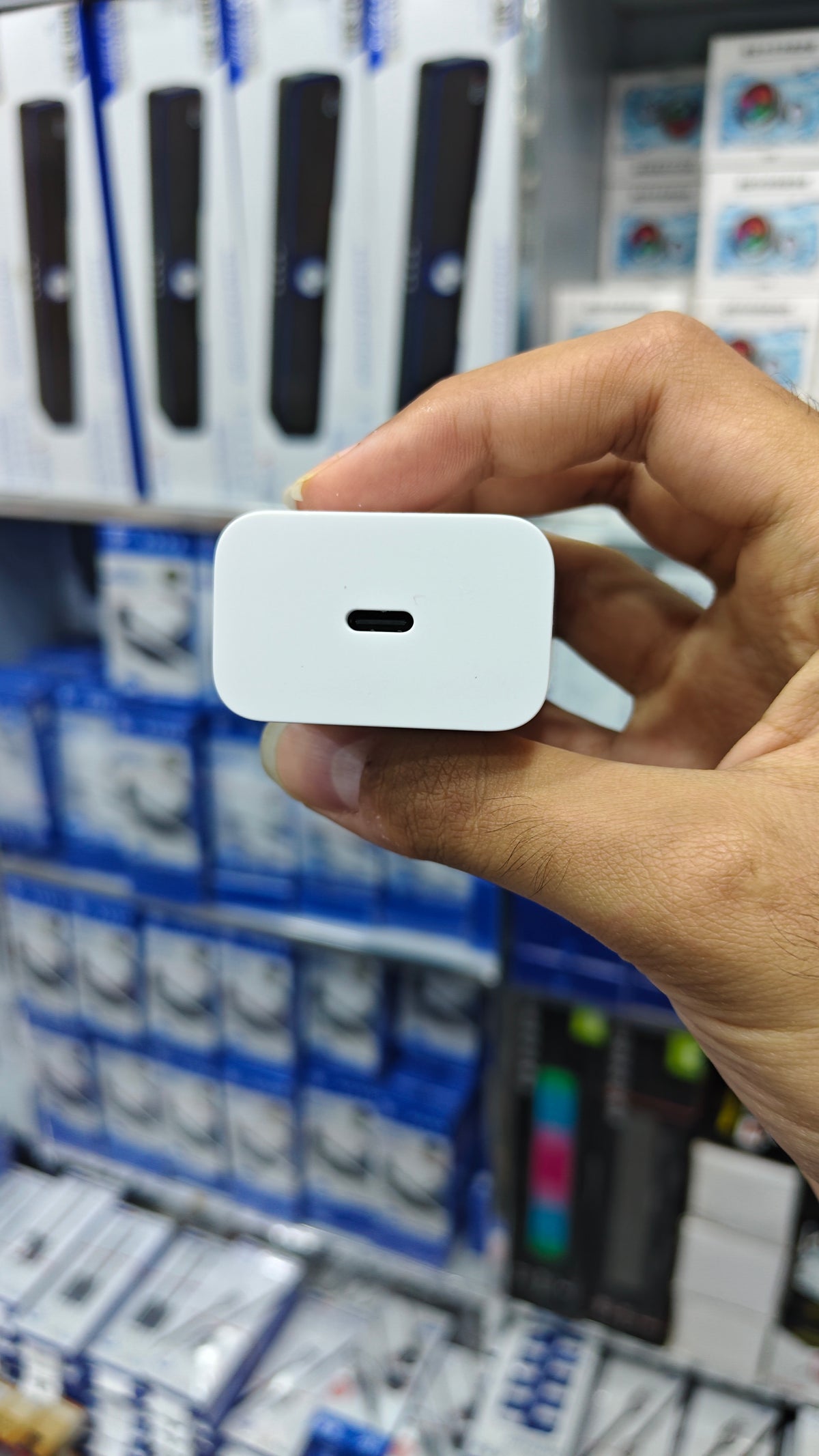 Google 30W USB-C adapter brick front view, box-pulled
