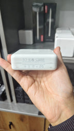 Apple 87W USB-C Power Adapter safety markings