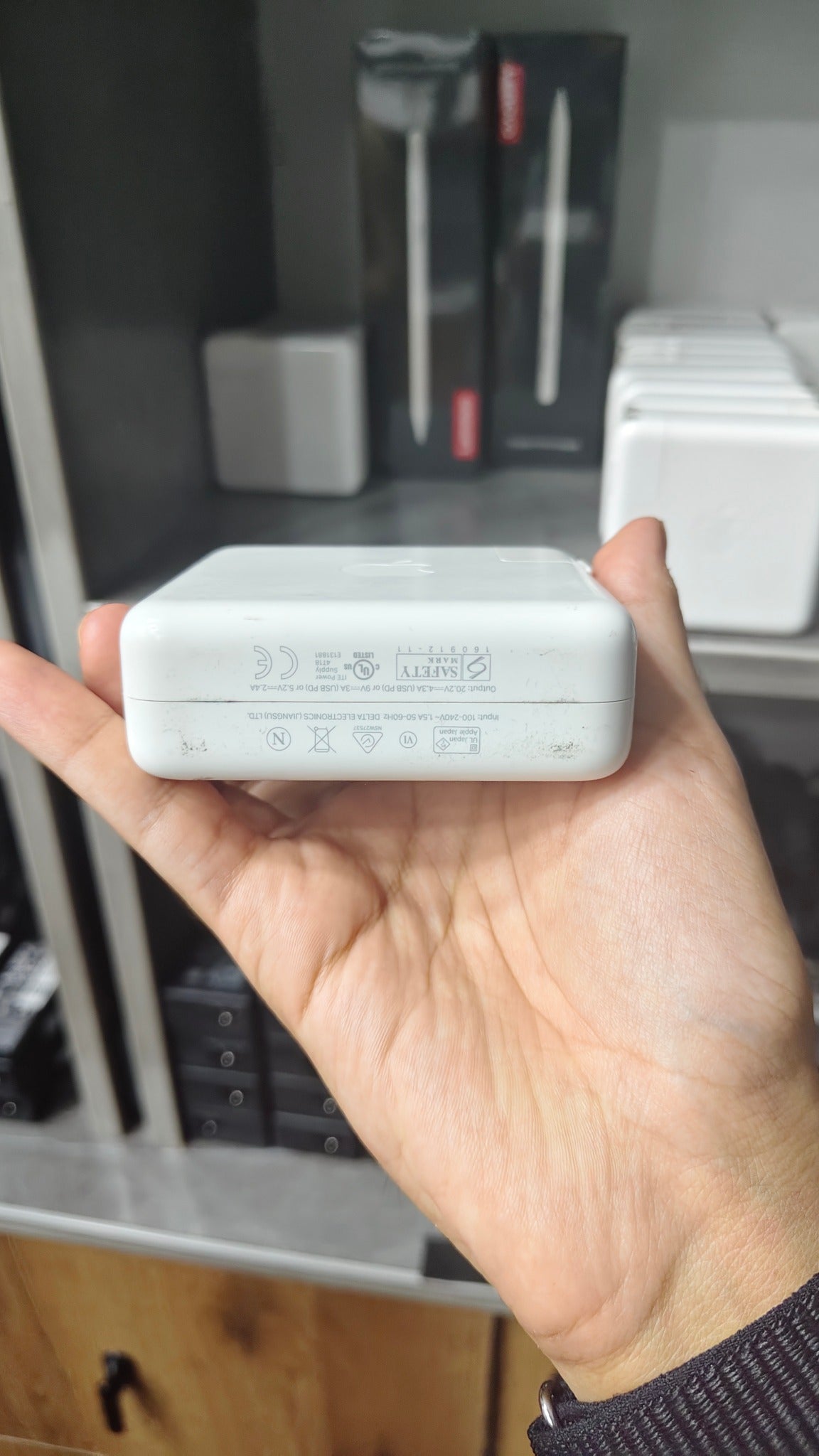 Apple 87W USB-C Power Adapter safety markings