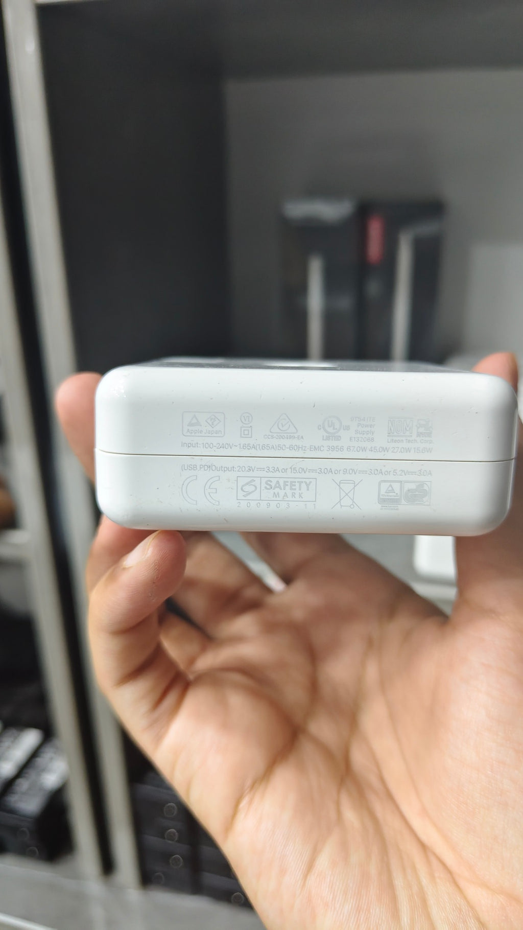 Apple 67W USB-C Power Adapter output and compliance markings