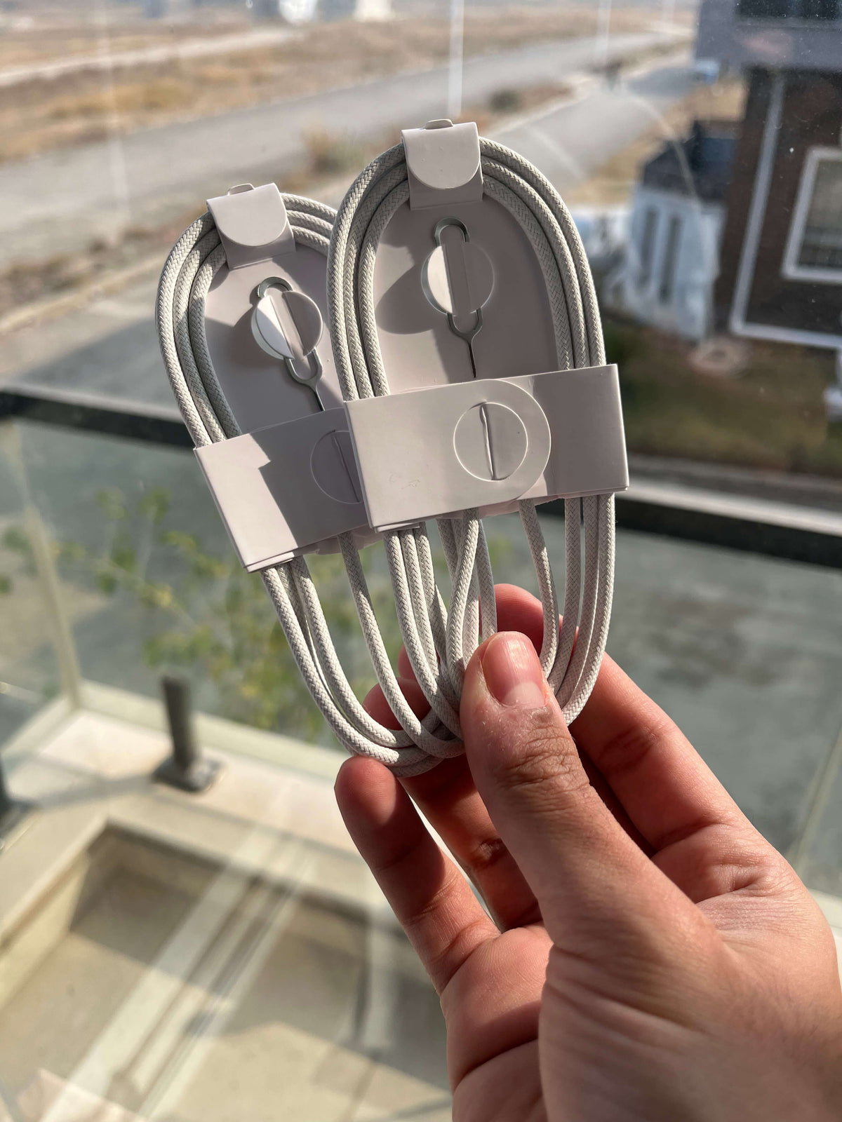 Braided 1m USB-C to USB-C cables coiled in retail holders
