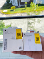 Apple 20W USB-C fast charger for iPhone — size comparison view Pakistan