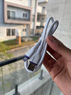 Phonnext 3.1A fast charging Lightning cable — in-use lifestyle view Pakistan