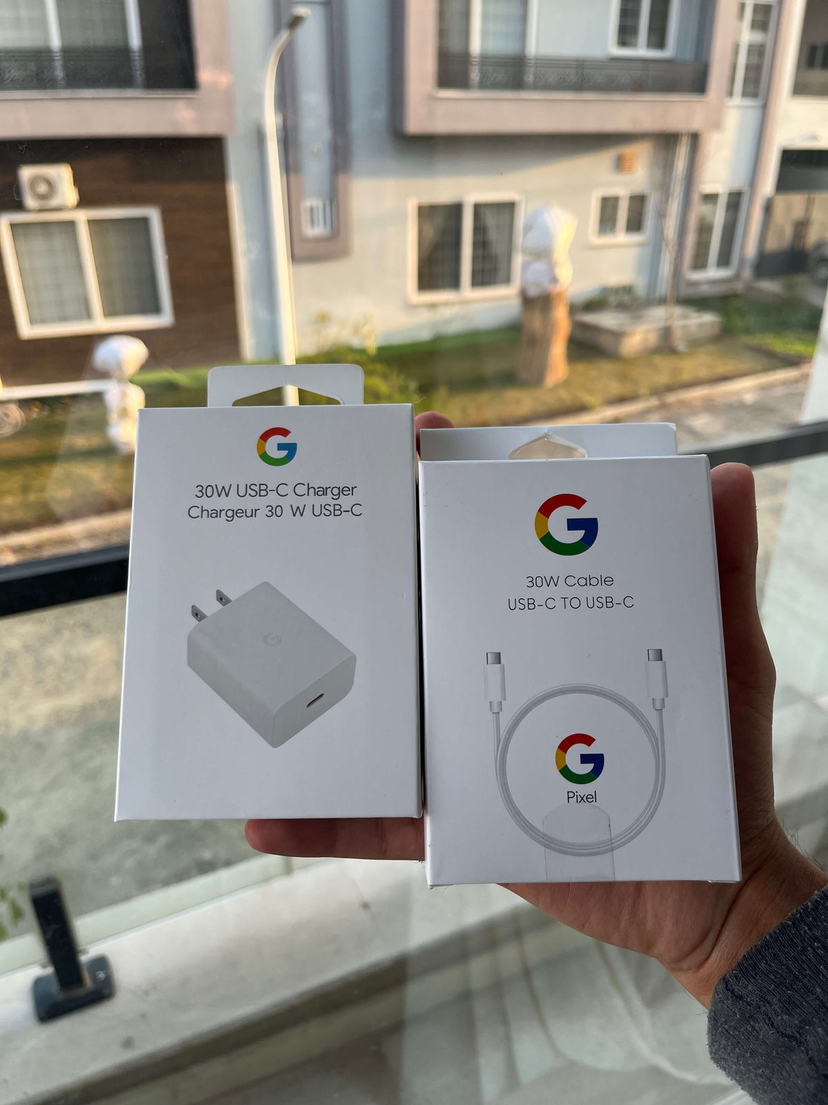 30W USB-C charger and included USB-C cable retail boxes