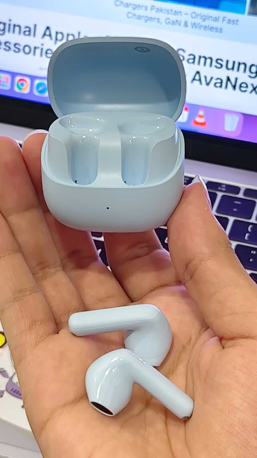 Baseus Bass BS1 NC earbuds with open charging case
