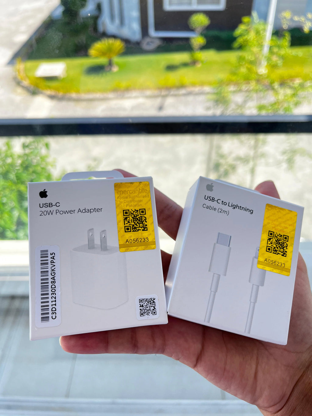 Apple 20W 2-Pin USB-C power adapter with free cable — packaging and box view Pakistan