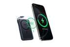 Baseus PicoGo AM61 power bank attached magnetically to a smartphone while charging